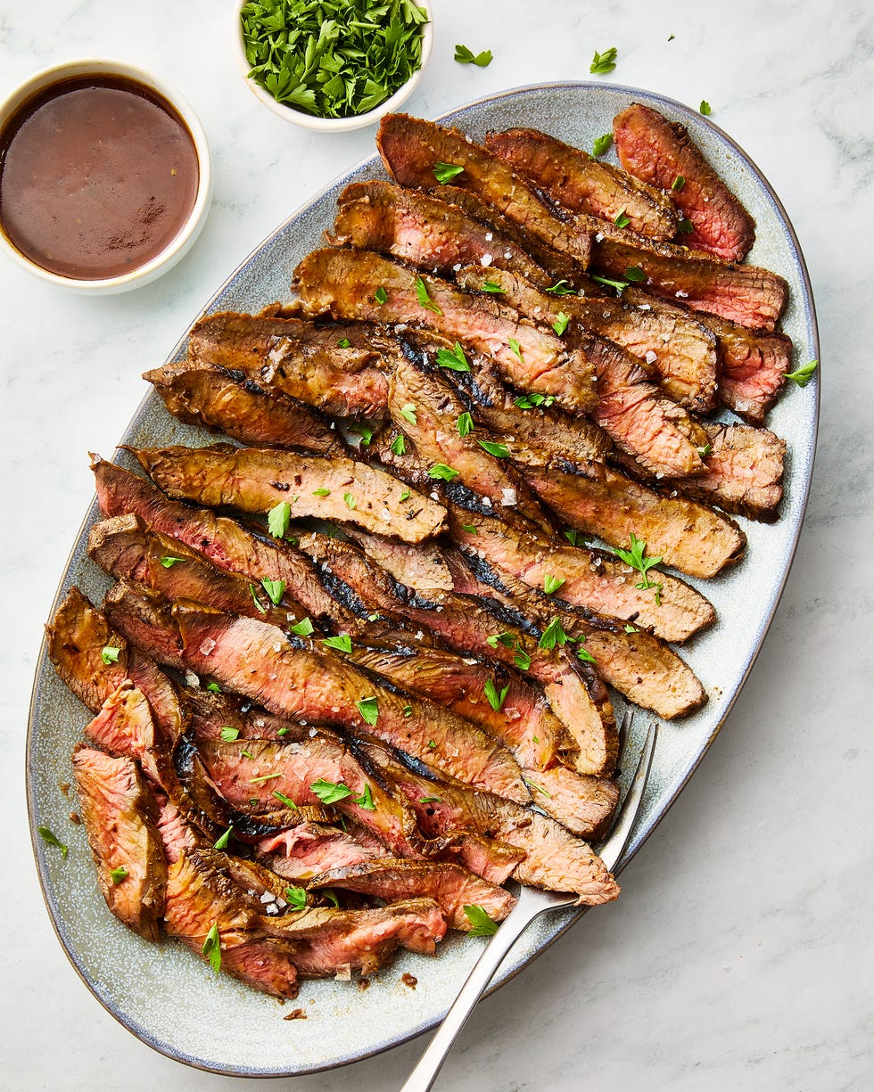 steak sliced and topped with cajun butter and herbs