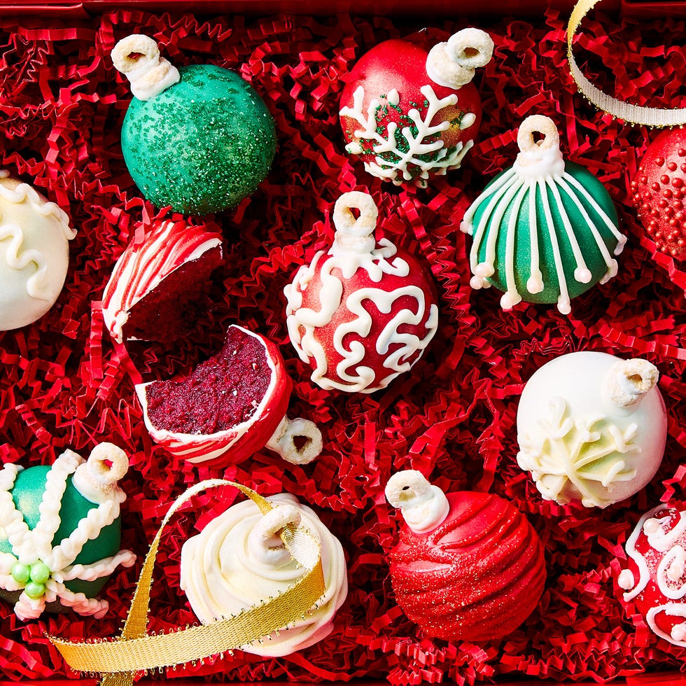 cake balls covered in icing and shaped like ornaments