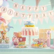 cake, candy and gifts at birthday party