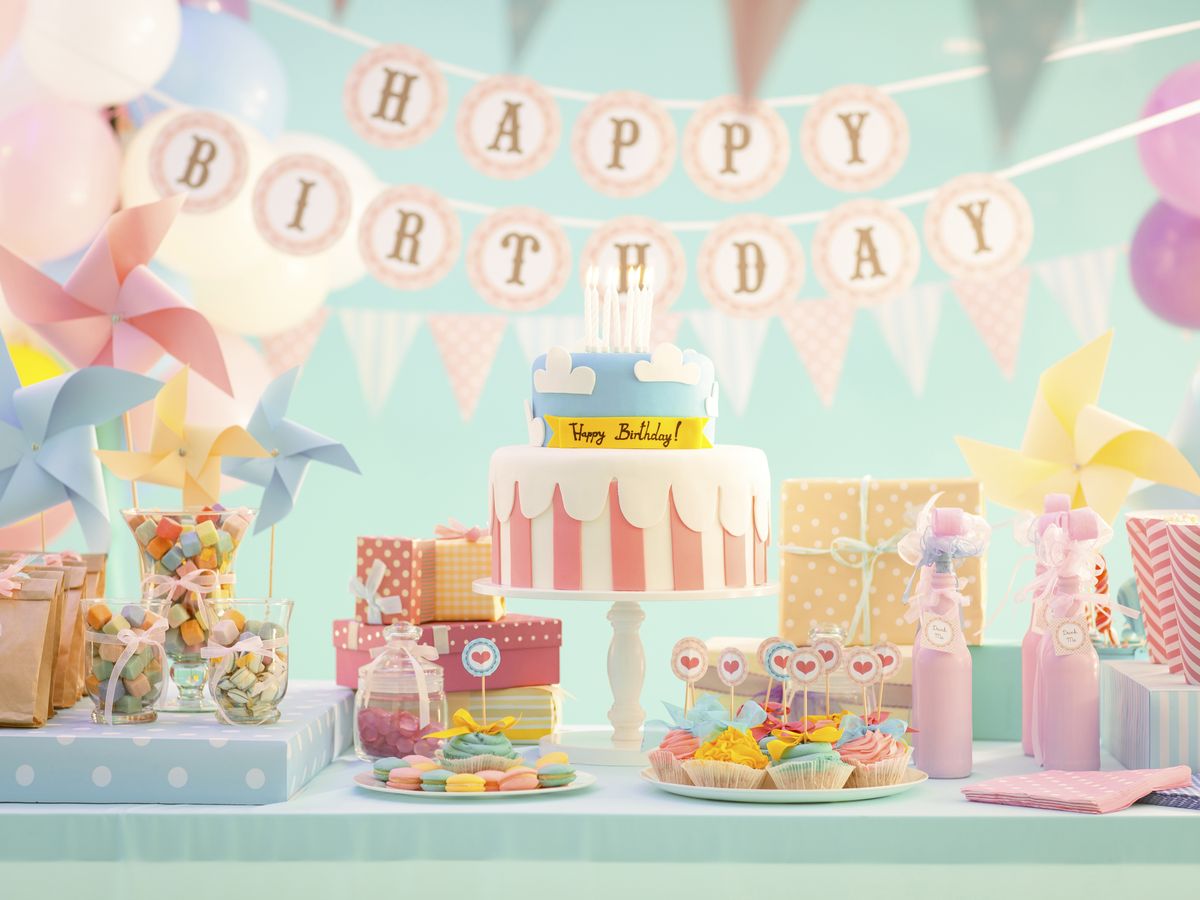https://hips.hearstapps.com/hmg-prod/images/cake-candy-and-gifts-at-birthday-party-royalty-free-image-1627469570.jpg?crop=0.88897xw:1xh;center,top&resize=1200:*