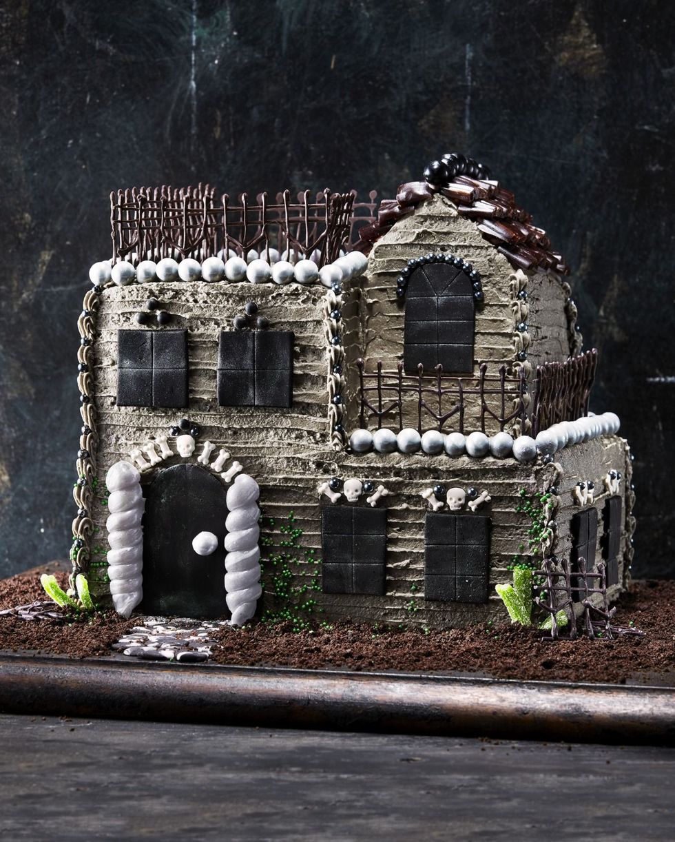 towering haunted house cake