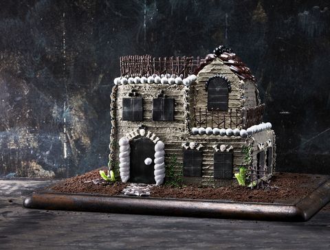 towering haunted house cake