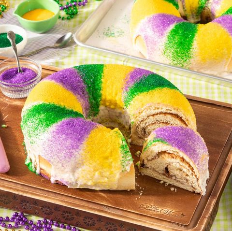 king cake made from scratch on a wooden cutting board
