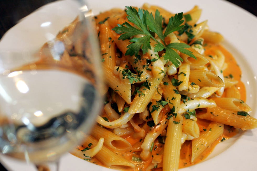 Calamari vodka pasta at the Morsello restaurant, The Strand, Croydon, 31 March 2