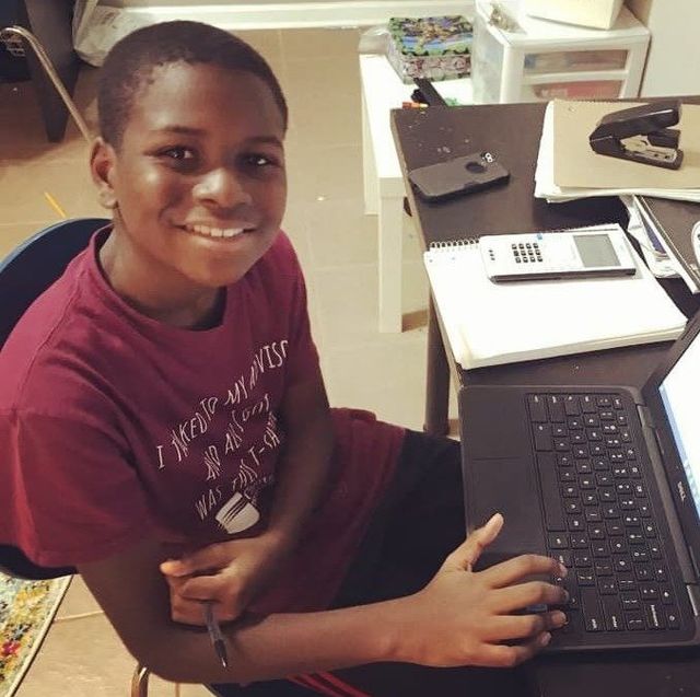 kid genius caleb anderson at his computer