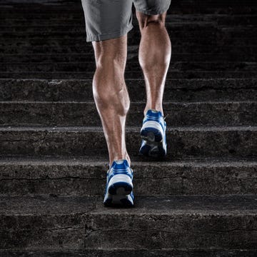 training, close up of young man running upstairs