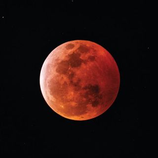 a red moon in the sky