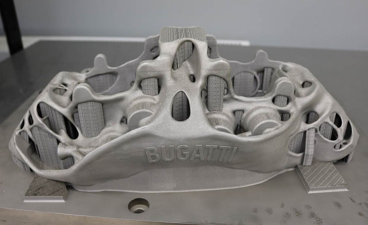How Automakers 3D Printing Parts for Production Cars (and Classics) | Feature Car and Driver