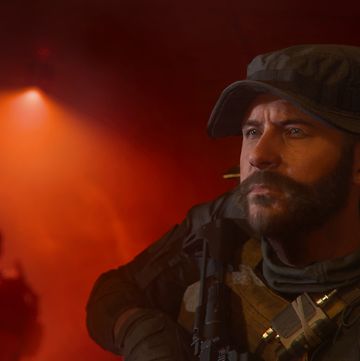 call of duty modern warfare iii john price with his gun against a red spotlight background