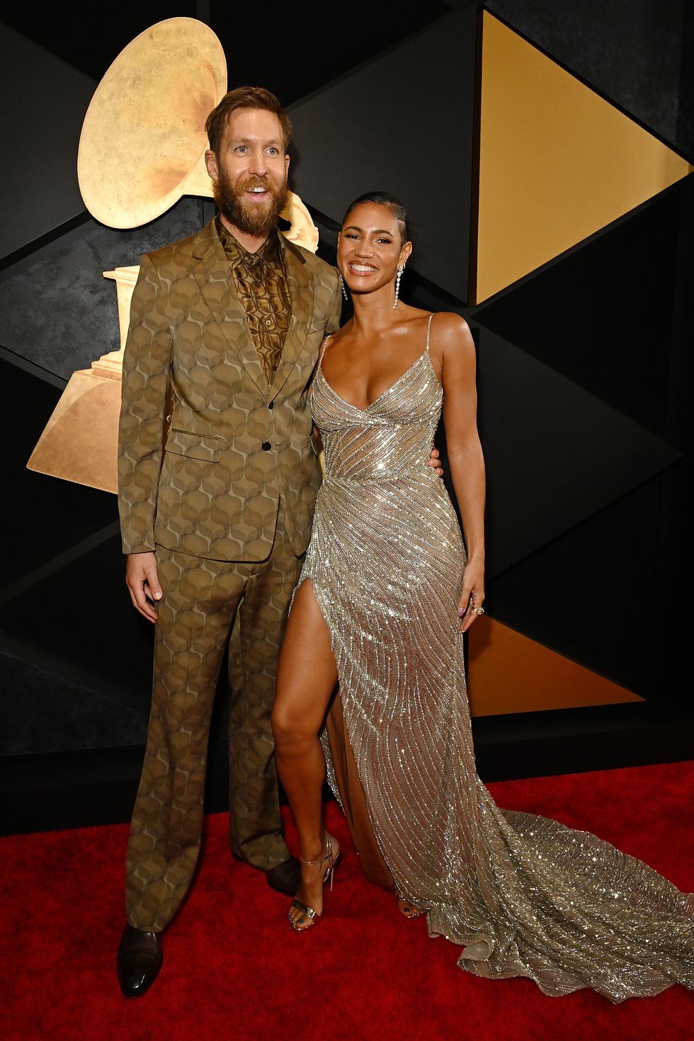 los angeles, california february 04 l r calvin harris and vick hope attend the 66th grammy awards at cryptocom arena on february 04, 2024 in los angeles, california photo by lester cohengetty images for the recording academy