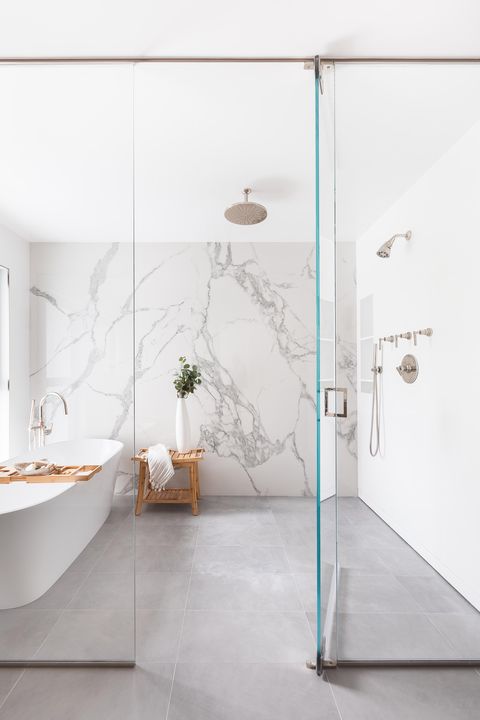 bathroom, marble wall, white bathtub
