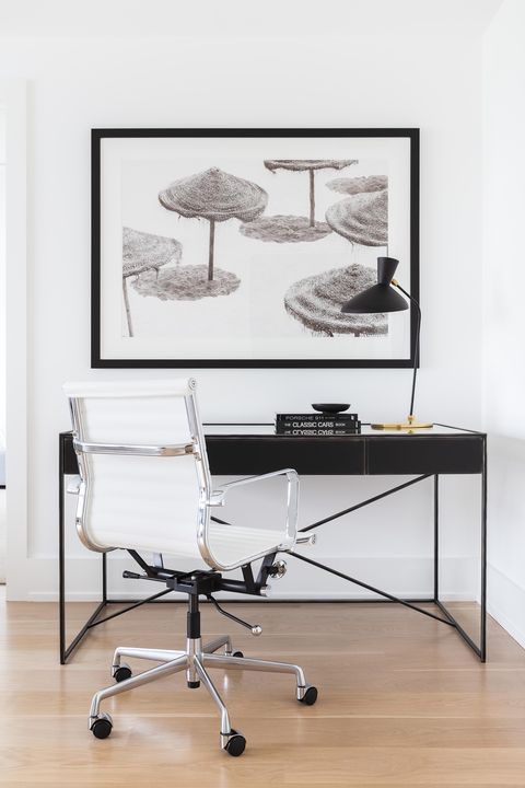 wood floors, black desk, white chair