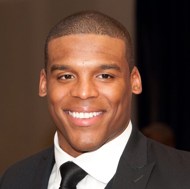 Cam Newton is almost grinning in his first picture in a Patriots