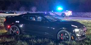 crashed chevy camaro after michigan state police chase