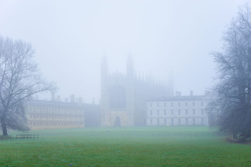 cambridge university against sky in city during foggy weather