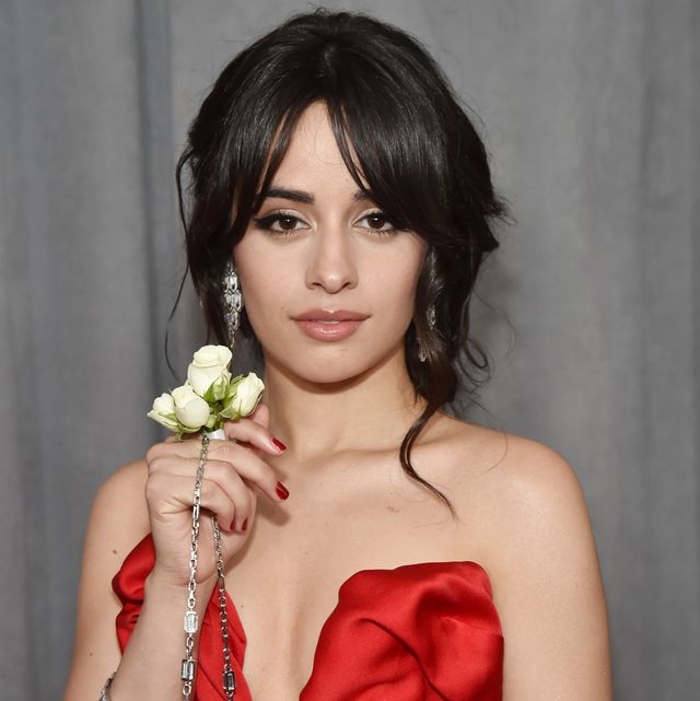 new york, ny   january 28  recording artist camila cabello, white rose detail, attends the 60th annual grammy awards at madison square garden on january 28, 2018 in new york city  photo by kevin mazurgetty images for naras