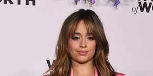camila cabello in a pink suit on the red carpet