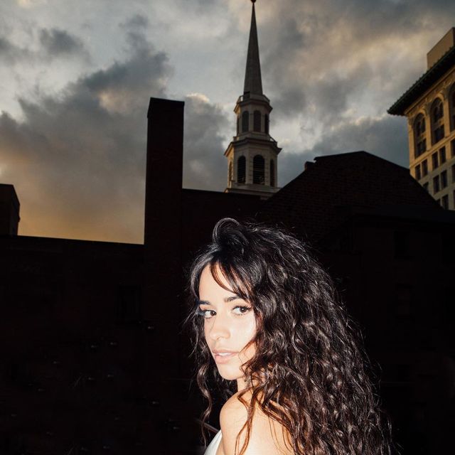 Hair, Sky, Beauty, Hairstyle, Long hair, Architecture, Shoulder, Fashion, Photography, Dress, 