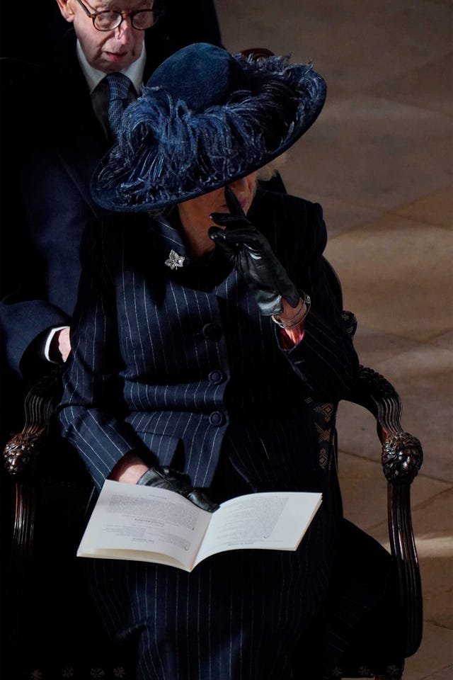 a person reina consorte camilain a garment