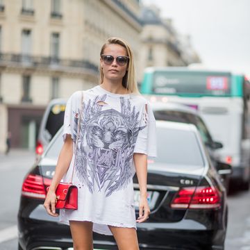 paris, france september 28 model natasha poly wearing a white tshirt as a dress is seen outside balmain during paris fashion week springsummer 2018 on september 28, 2017 in paris, france photo by christian vieriggetty images