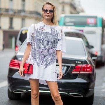 paris, france september 28 model natasha poly wearing a white tshirt as a dress is seen outside balmain during paris fashion week springsummer 2018 on september 28, 2017 in paris, france photo by christian vieriggetty images