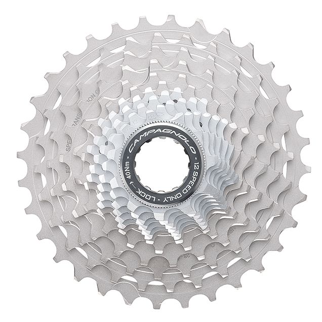 Bicycle part, Derailleur gears, Auto part, Gear, Tool accessory, Saw blade, Bicycle drivetrain part, Hardware accessory, 