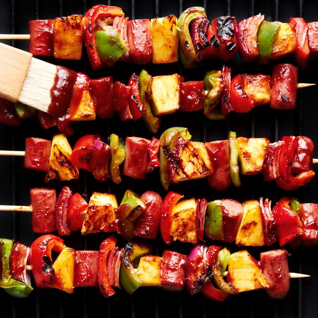 grilled skewers with sliced hot dogs, pineapple, red bell peppers basted with a bbq sauce