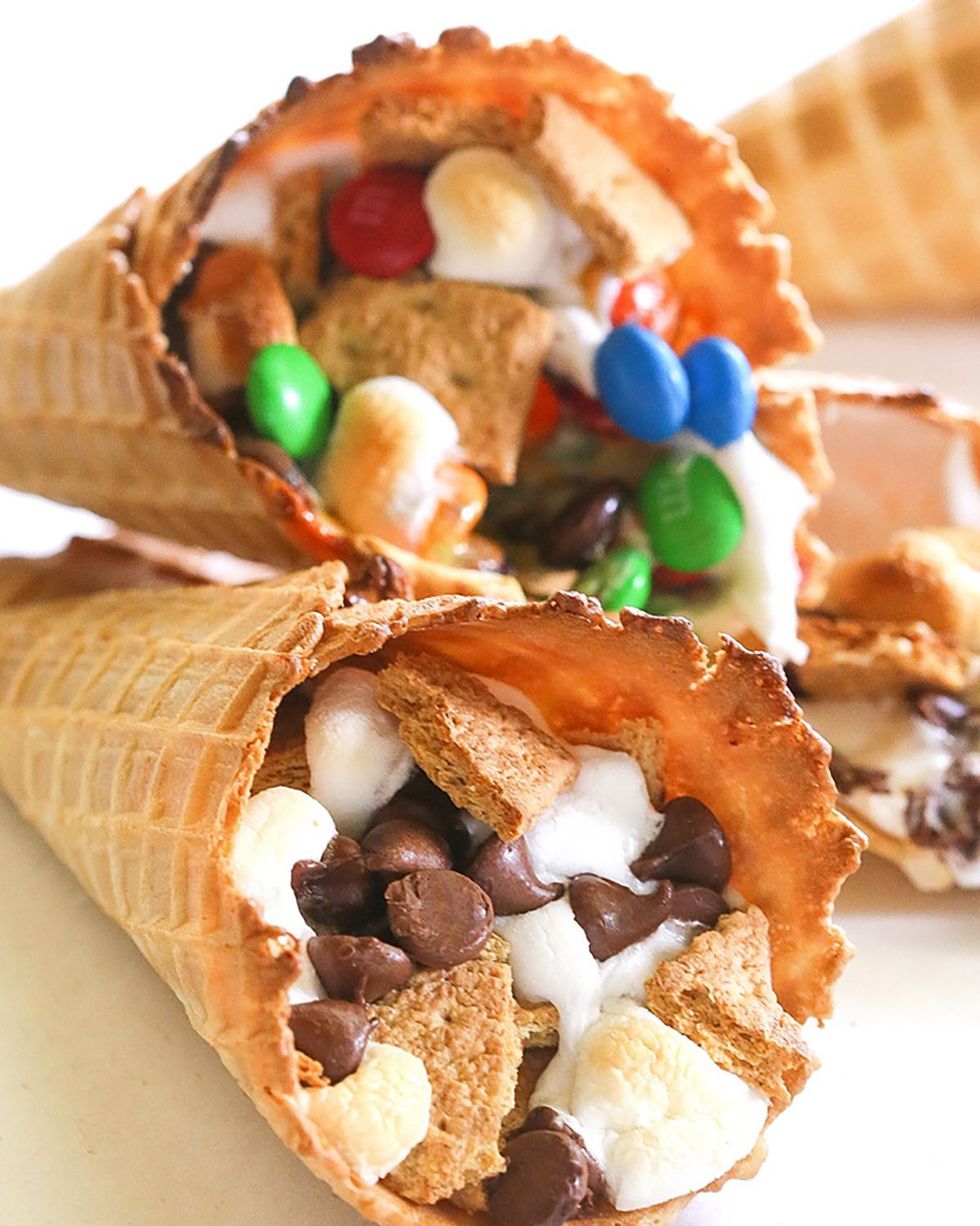 campfire cones filled with marshmallows chocolate chips and graham pieces