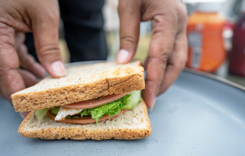 camping in the forest sandwiches in a basket