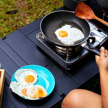 cooking eggs on camping kitchen