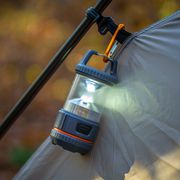 camping lantern attached to tent