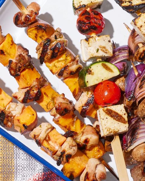 chicken and sweet potato kebabs on wooden skewers