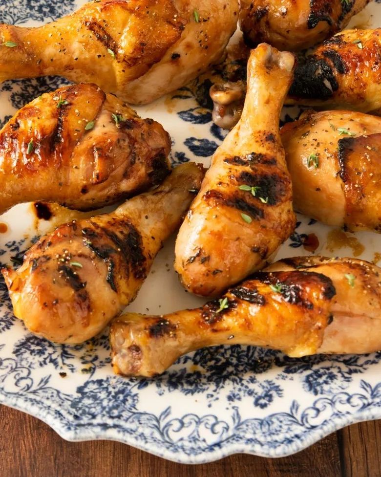 https://hips.hearstapps.com/hmg-prod/images/camping-recipes-grilled-chicken-marinade-1652731243.jpeg?crop=0.796734693877551xw:1xh;center,top&resize=980:*