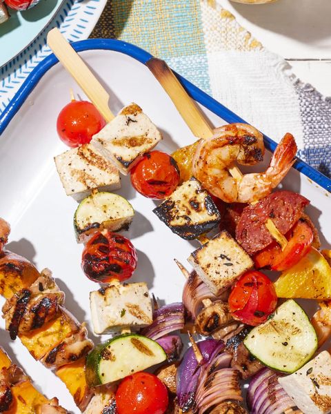 tofu tomato and zucchini kebabs on wooden skewers
