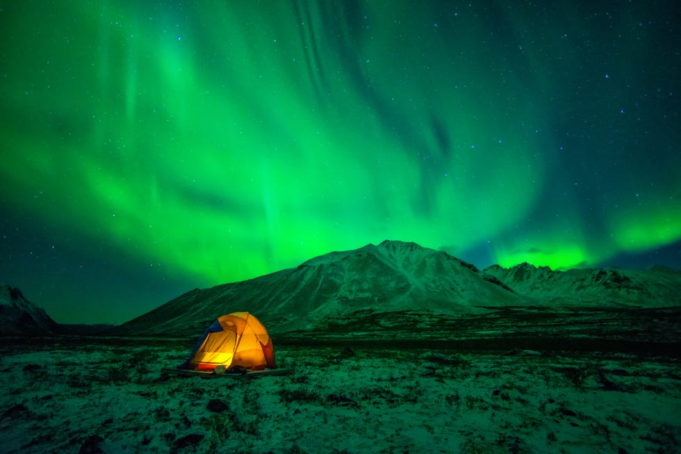 camping under northern lights