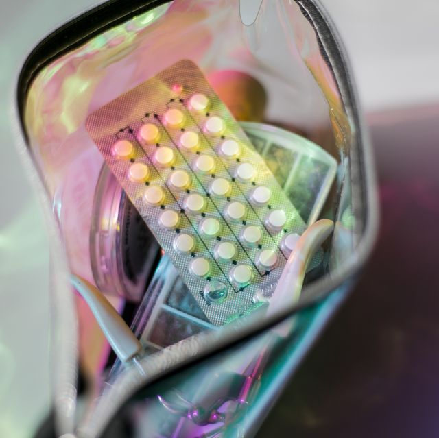 birth control pills in a metallic holographic bag