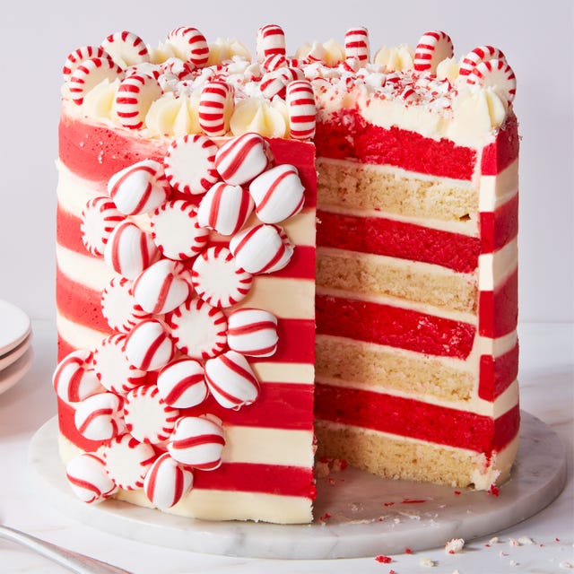 Candy Cane Cake white and red striped cake topped with candy canes