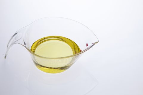 cooking oil in measuring cup