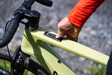 a person turning on an e bicycle