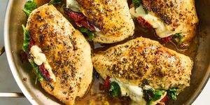 chicken breasts sliced and stuffed with mozzarella cheese, sun dried tomatoes and spinach