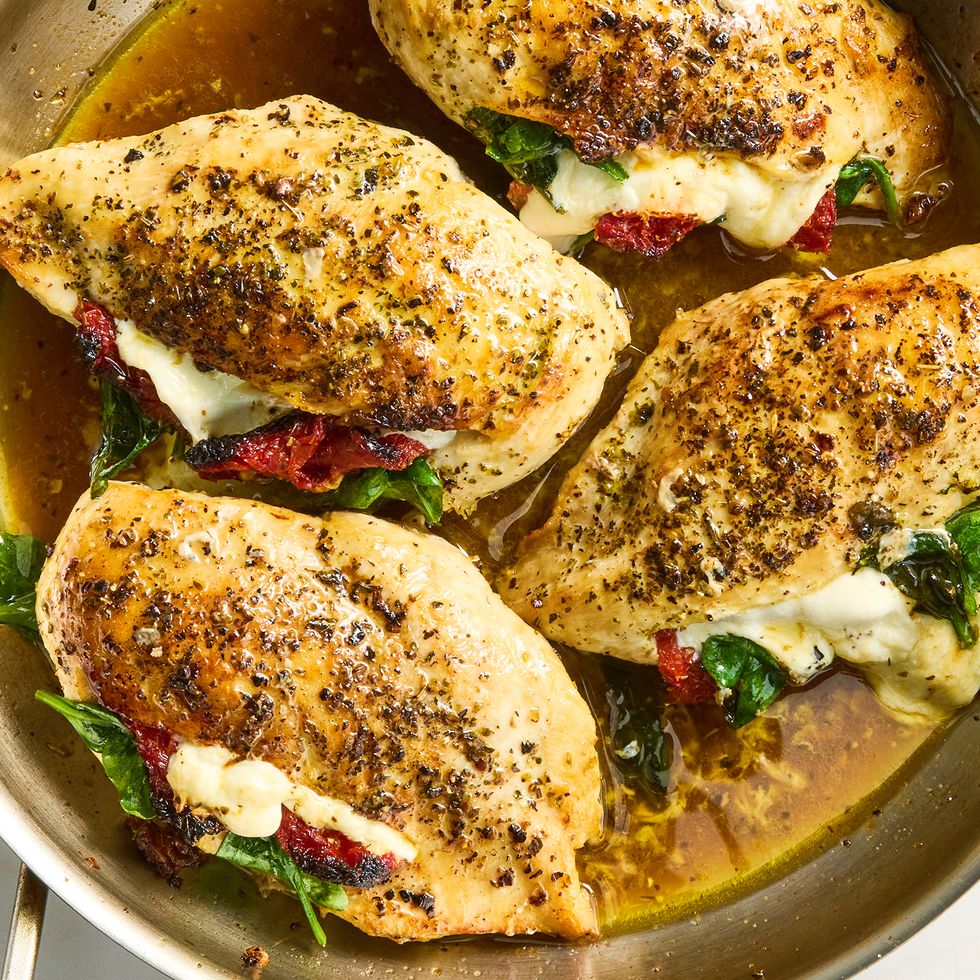 chicken breasts sliced and stuffed with mozzarella cheese, sun dried tomatoes and spinach