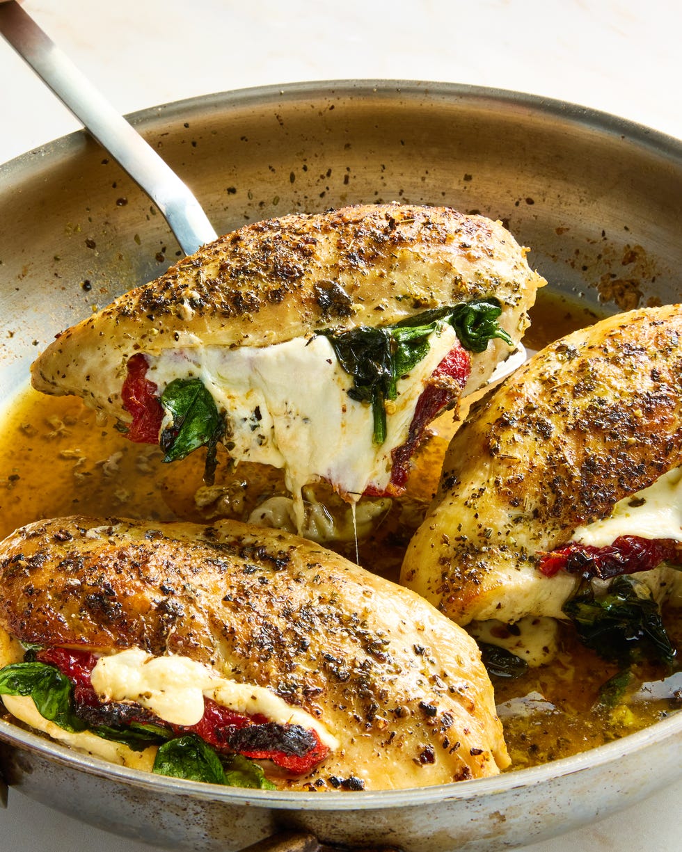 chicken breasts sliced and stuffed with mozzarella cheese, sun dried tomatoes and spinach
