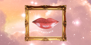 a pair of pink lips smile inside a picture frame over a pink cloudy sky the word "capricorn" is below the bottom lip