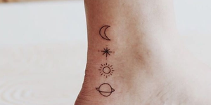 Skin, Tattoo, Ankle, Joint, Temporary tattoo, Neck, Arm, Font, Flesh, Human body, 