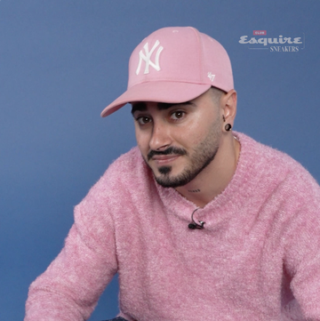 a man wearing a pink hat and a pink shirt