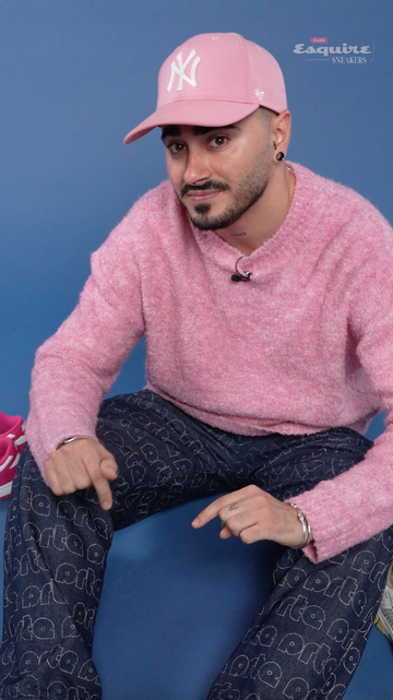 a man wearing a pink hat and a pink shirt