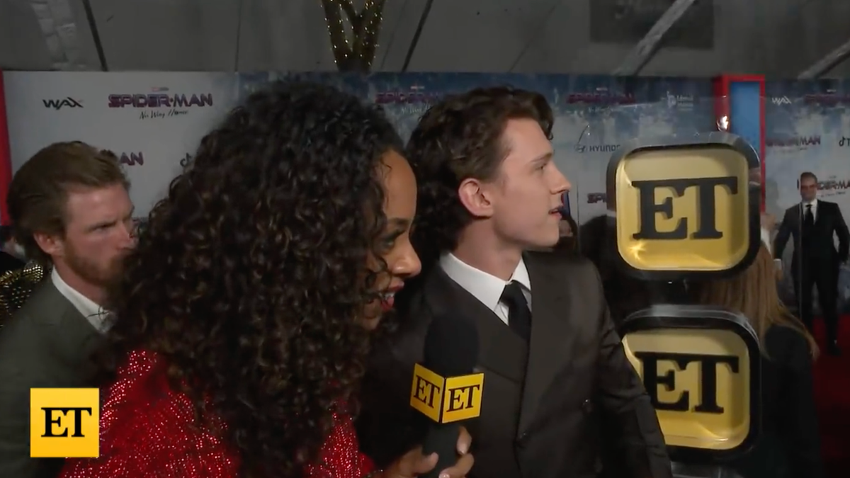 Watch Tom Holland Stop an Interview to See Zendaya Arrive at the