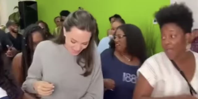 This Footage of Angelina Jolie Doing the Electric Slide at