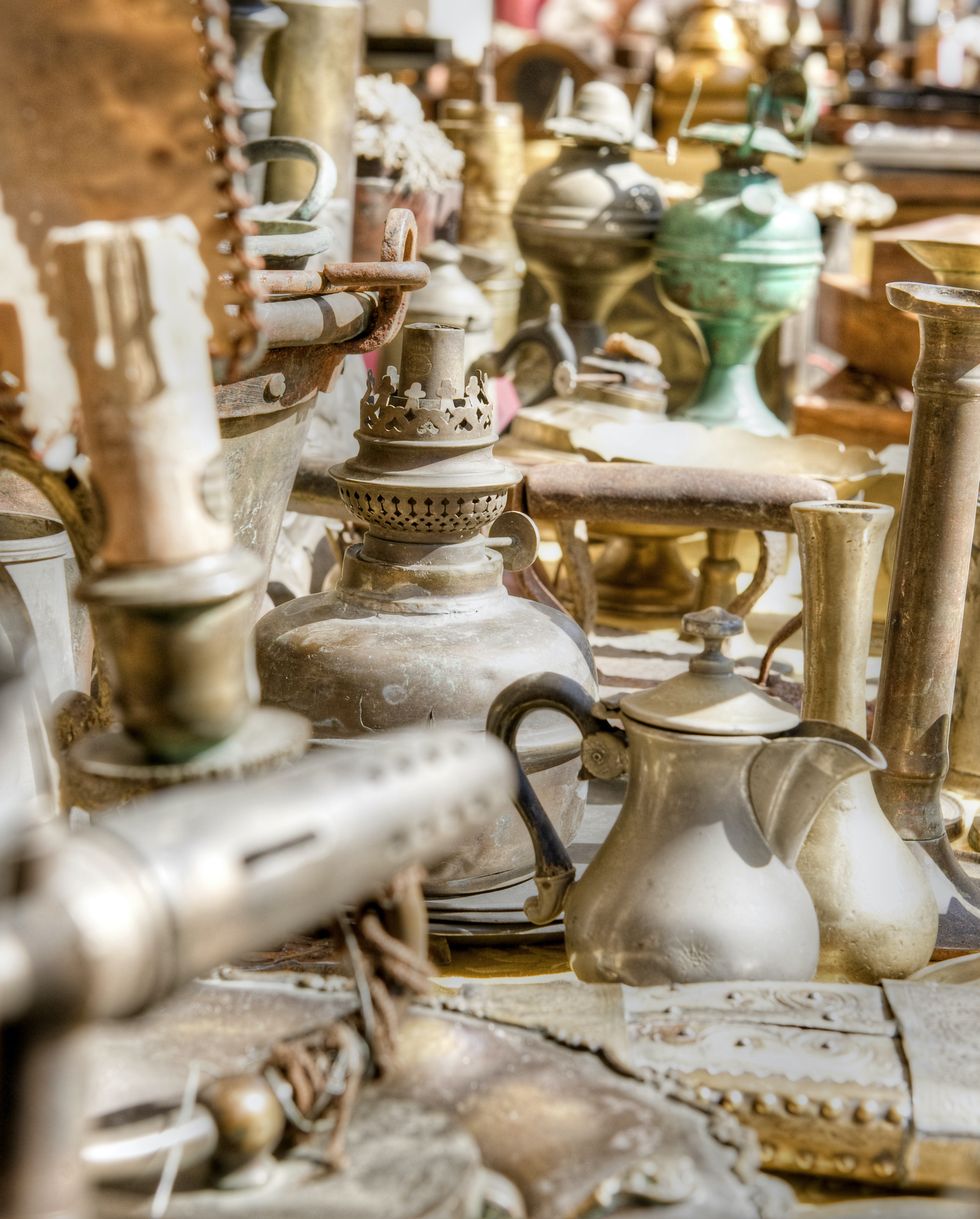 brass antiques at a market stall in italy hdr processing