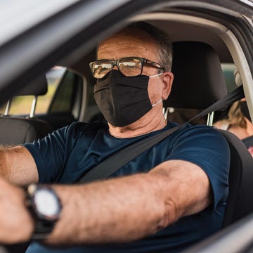 car driver wearing protective mask